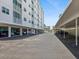 Spacious covered parking area in front of the condominium, offering ample parking spaces for residents and guests at 10216 Regal Dr # 409, Largo, FL 33774