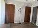 Spare bedroom with bifold closet doors and modern lighting fixtures at 11807 Addison St, Spring Hill, FL 34609