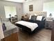 Comfortable bedroom with a bed, nightstands, and tasteful decor at 11807 Addison St, Spring Hill, FL 34609