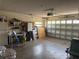 Spacious garage with overhead door and ample storage, offering secure parking and organization at 11807 Addison St, Spring Hill, FL 34609