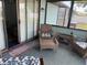 Relaxing screened patio with comfortable wicker furniture at 11807 Addison St, Spring Hill, FL 34609