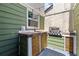 This outdoor kitchen features a built-in grill and counter with sink for outdoor gatherings at 12516 Cobble Stone Dr, Hudson, FL 34667