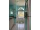 Bright bathroom featuring a soaking tub, large window, and a neutral color palette at 13339 Amberwood St, Hudson, FL 34669