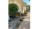 Landscaped front yard featuring colorful tropical plants and rock garden at 13339 Amberwood St, Hudson, FL 34669