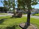 This cozy house features a lush landscaped front yard with beautiful trees at 13339 Amberwood St, Hudson, FL 34669