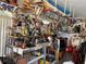 Functional and organized garage space, including a large work table, for hobbyists and home repair projects at 13339 Amberwood St, Hudson, FL 34669