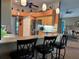 Open kitchen with a large island, modern appliances, and seamless transition into the living spaces at 13339 Amberwood St, Hudson, FL 34669