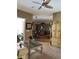 Elegant living room with a comfortable seating area, stylish decor, and seamless access to the dining space at 13339 Amberwood St, Hudson, FL 34669