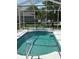 Beautiful private pool is screened-in, and is ready for your enjoyment at 13339 Amberwood St, Hudson, FL 34669