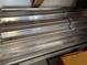 Neatly stacked aluminum profiles for construction, ensuring durability and quality at 13339 Amberwood St, Hudson, FL 34669