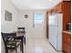 Cozy breakfast nook in the kitchen with table and view of ocean at 13500 Gulf Blvd # 506, Madeira Beach, FL 33708