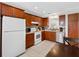 Spacious kitchen with ample counter space and modern appliances at 13500 Gulf Blvd # 506, Madeira Beach, FL 33708