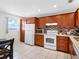 Spacious kitchen boasts ample cabinetry and modern appliances for culinary adventures at 13500 Gulf Blvd # 506, Madeira Beach, FL 33708
