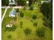 Aerial shot of the home and yard with outbuildings at 14318 Guava St, Hudson, FL 34667