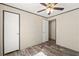 Bedroom with closet features natural light and laminate flooring at 16070 La Bella St, Brooksville, FL 34604