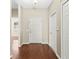 Bright foyer features wood floors and neutral paint, creating a welcoming entrance to the home at 1611 Cresson Ridge Ln, Brandon, FL 33510