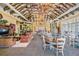 Spacious clubhouse with beautiful chandeliers, ample seating, and a cozy lounge area at 19312 Sunset Bay Dr, Land O Lakes, FL 34638