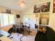 Bedroom with desk, instruments, fan, and window providing natural light at 2041 Gold Dust Ct, Trinity, FL 34655