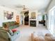 Bright living room featuring a fireplace and an open floor plan at 2041 Gold Dust Ct, Trinity, FL 34655