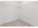 Walk-in closet with wire shelving for optimal storage at 22489 Storybook Cabin Way, Land O Lakes, FL 34637