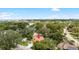 Charming single-Gathering home with lush, mature landscaping and a long driveway at 2306 S San Jose Cir, Tampa, FL 33629