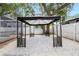 Backyard gazebo sitting on decorative white gravel at 2306 S San Jose Cir, Tampa, FL 33629