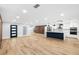 Open floor plan with tile flooring, kitchen with island, and sliding door to a outdoor space at 2306 S San Jose Cir, Tampa, FL 33629