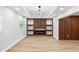 Bright living room showcases a modern accent wall with fireplace, sleek shelving, and stylish lighting at 2306 S San Jose Cir, Tampa, FL 33629