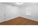 Bright bedroom features hardwood floors and a window providing natural light at 2312 Highland S St, St Petersburg, FL 33705