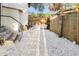 The backyard has a gravel yard, fenced perimeter and stairs leading to the house at 2315 E 12Th Ave, Tampa, FL 33605