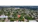 Excellent aerial view shows beautiful neighborhood homes with mature tree coverage and city in distance at 2519 1St N Ave, St Petersburg, FL 33713