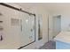 This bathroom boasts a tub and shower with a glass door and white subway tile at 2519 1St N Ave, St Petersburg, FL 33713