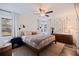 Stylish bedroom with a ceiling fan, bay window, and wooden furnishings at 2519 1St N Ave, St Petersburg, FL 33713