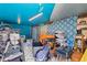 Garage interior with blue walls, storage, and personal items at 2519 1St N Ave, St Petersburg, FL 33713