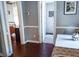 Inviting hallway between kitchen, bathroom, and bedroom with charming details at 2519 1St N Ave, St Petersburg, FL 33713