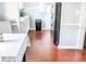 Bright kitchen with ample cabinet space, stainless steel appliances, and hardwood floors at 2519 1St N Ave, St Petersburg, FL 33713