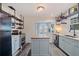 Bright kitchen featuring shaker cabinets, stainless appliances, and butcher block island at 2519 1St N Ave, St Petersburg, FL 33713