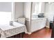 Well-lit kitchen with dining nook, white cabinets, and modern appliances at 2519 1St N Ave, St Petersburg, FL 33713