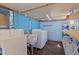 Laundry room with washer, dryer, sink, and shelves, wood-look flooring at 2519 1St N Ave, St Petersburg, FL 33713