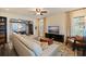 Comfortable living room boasts ample seating, natural light, and seamless flow into the dining area at 2519 1St N Ave, St Petersburg, FL 33713