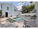 Backyard with pool, patio, and seating for relaxing and entertaining guests at 2519 1St N Ave, St Petersburg, FL 33713