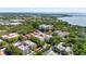 An aerial view of the community highlighting the beautiful location near the water and bridge at 2630 Pearce Dr # 108, Clearwater, FL 33764