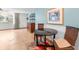 Bright dining area features stylish furniture, a colorful rug, and a large window at 2630 Pearce Dr # 108, Clearwater, FL 33764