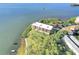 Gorgeous aerial view of the waterfront condo complex with lush greenery around the building at 2700 Bayshore Blvd # 11308, Dunedin, FL 34698