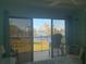 Enjoy waterfront views from this bedroom suite, featuring access to the balcony through sliding glass doors at 2700 Bayshore Blvd # 11308, Dunedin, FL 34698