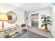 Elevator entrance with waiting area, table, and plant at 2700 Bayshore Blvd # 11308, Dunedin, FL 34698