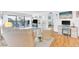 Bright living room with waterfront view, comfortable seating, and modern decor, creating a relaxing ambiance at 2700 Bayshore Blvd # 11308, Dunedin, FL 34698