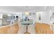 Bright living space featuring dining and seating area, a computer desk, and natural light at 2700 Bayshore Blvd # 11308, Dunedin, FL 34698