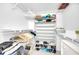 Organized walk-in closet with shelving and hanging space for clothes and shoes at 2700 Bayshore Blvd # 11308, Dunedin, FL 34698