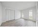 Bright bedroom with ample natural light, and closet space at 2900 Sandpiper Pl, Clearwater, FL 33762